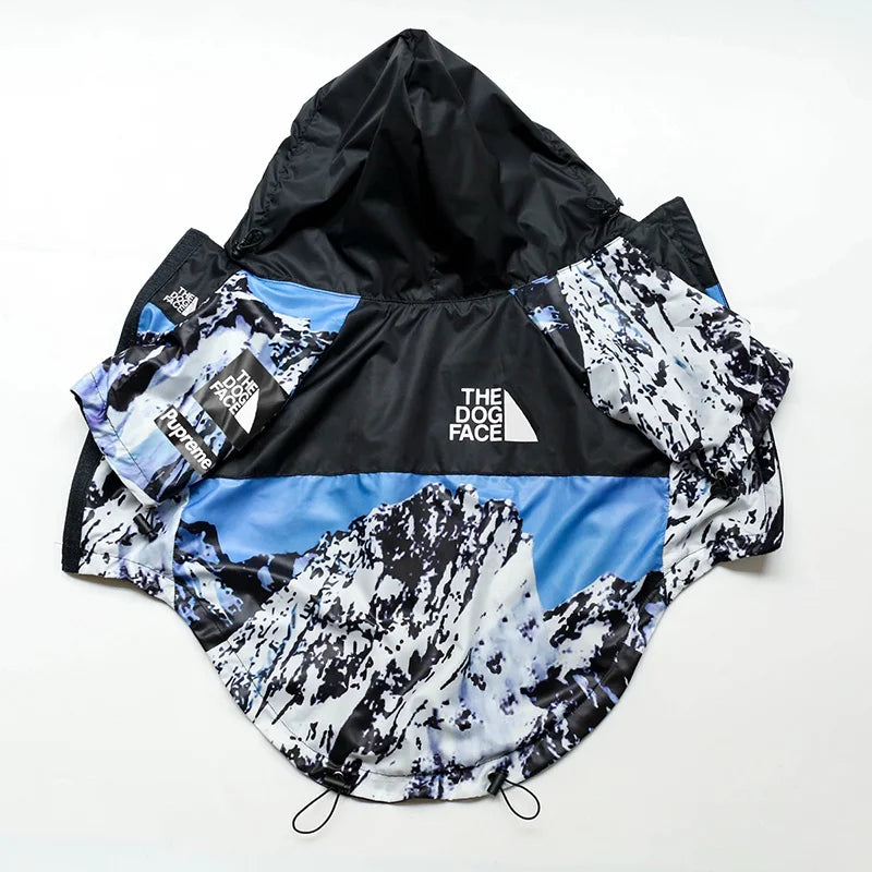 Whisker cove waterproof pet jacket in blue black and white with mountains